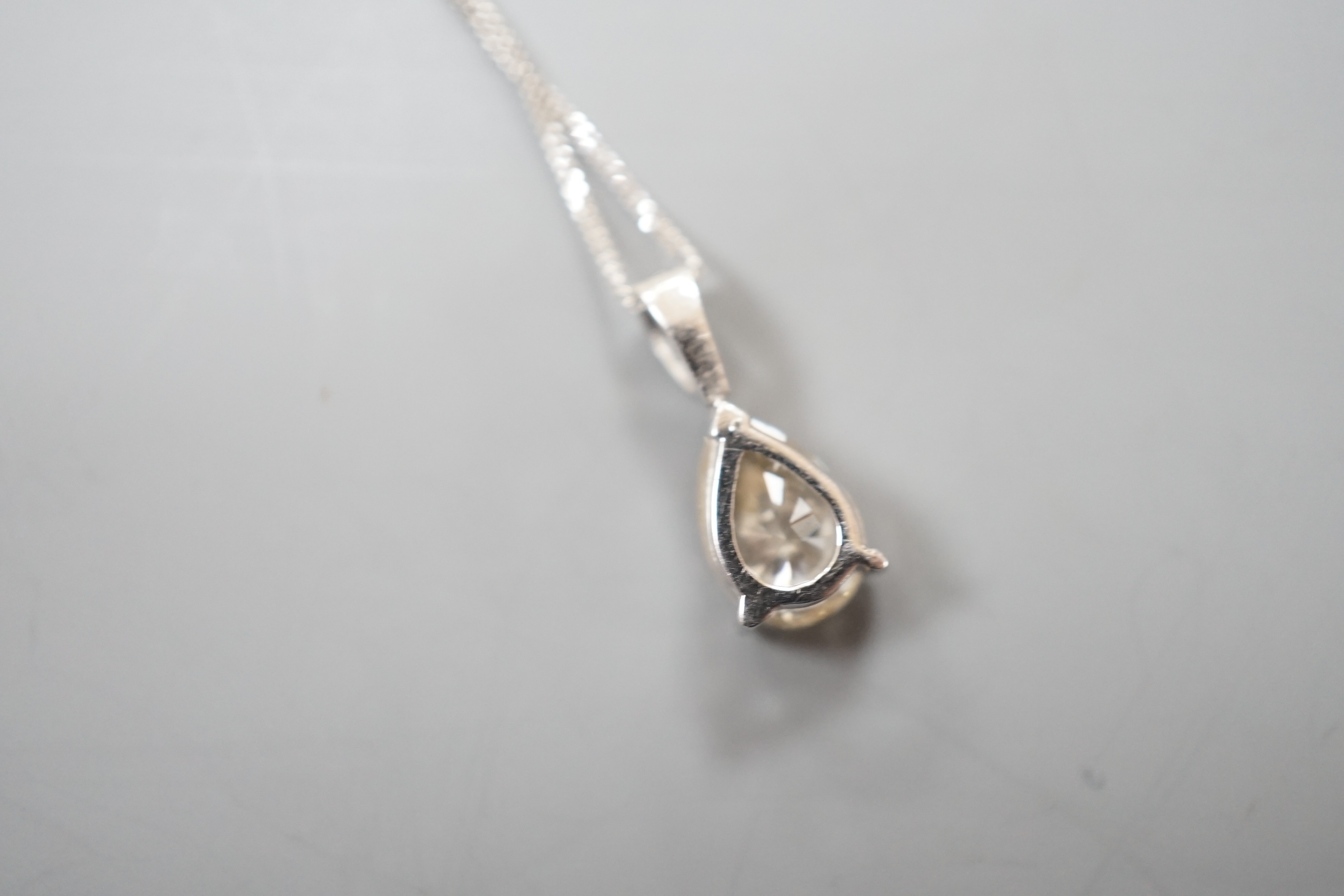 A modern white metal and light brown pear cut diamond set pendant, 14mm, on an 18ct white gold fine link chain, 45cm